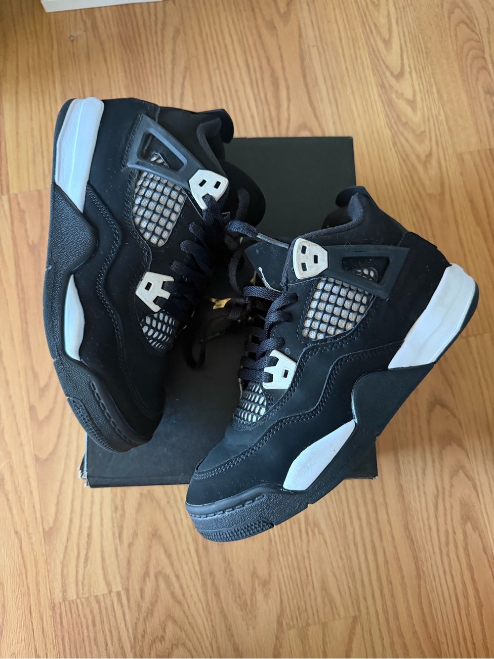 Jordan Kids Black and White High-Top Sneakers